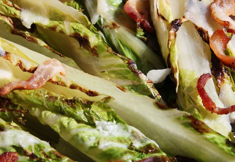 Seared Romaine Hearts Gratin with Bacon, Zesty Vinaigrette