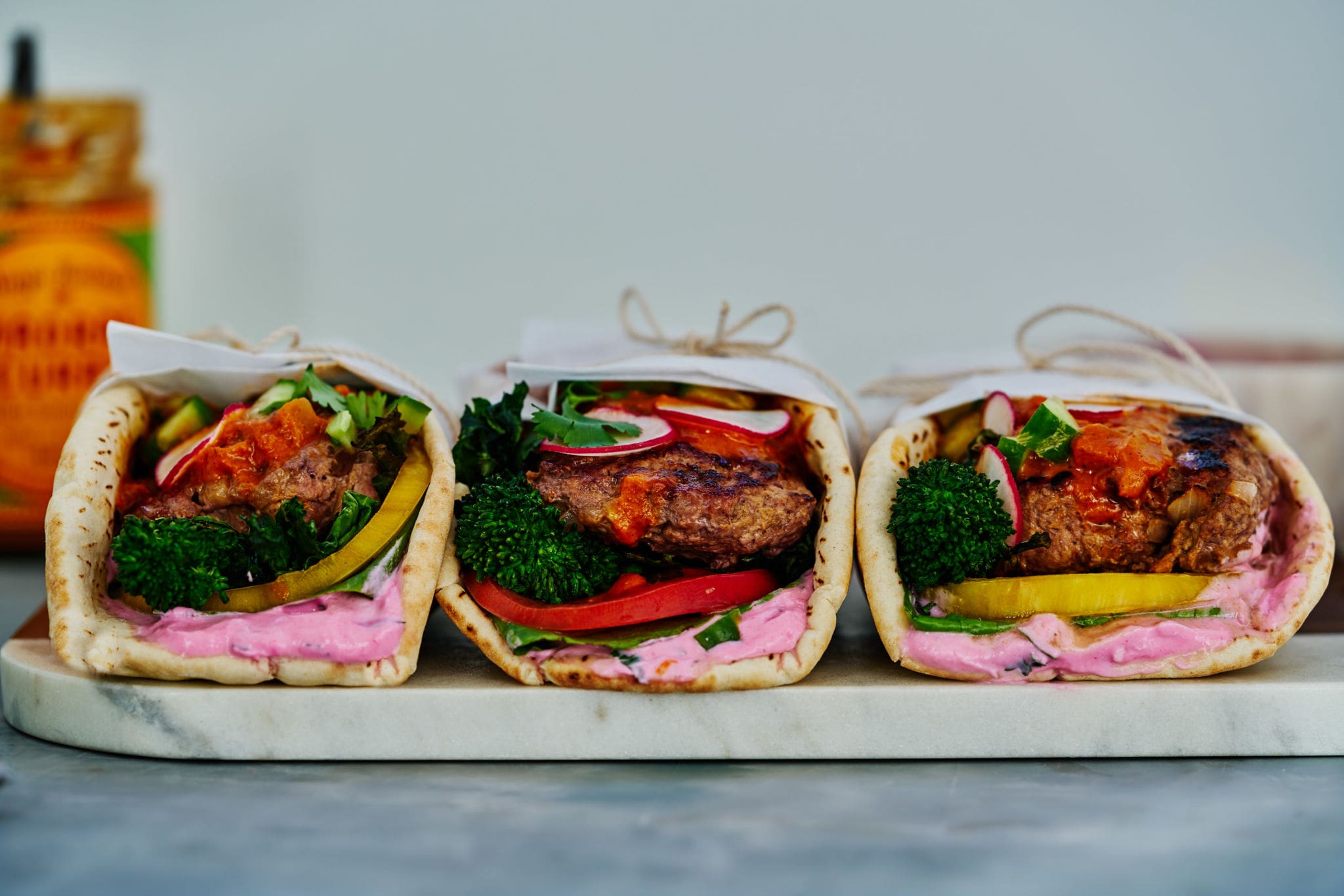 Madras Curry Lamb Burger Gyro with Broccoli Rabe and Cactus Pear Yogurt